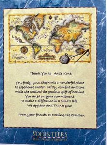 Healing the Children volunteer appreciation certificate to Adele Kone.