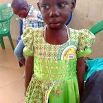 Young girl with cross Burkina Faso